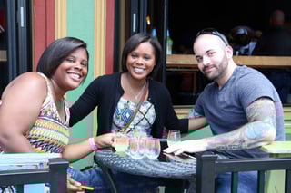 festival-tasting-general-group-summer-spring-2-ladies-1-guy-on-patio-at-table.jpg