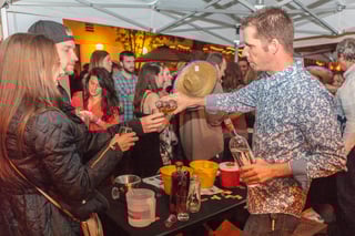 2018-summer-tequila-festival-summer-pouring-tequila-to-couple.jpg